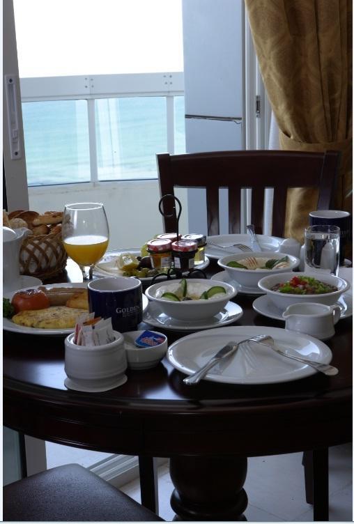 Tulip Inn Royal Suites Adschman Zimmer foto