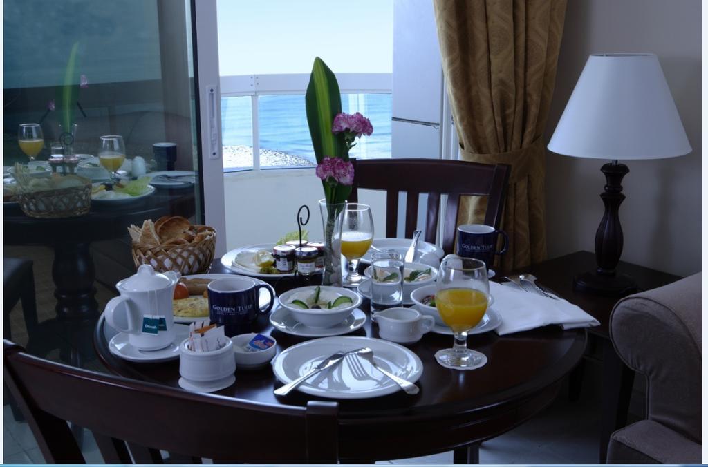 Tulip Inn Royal Suites Adschman Zimmer foto