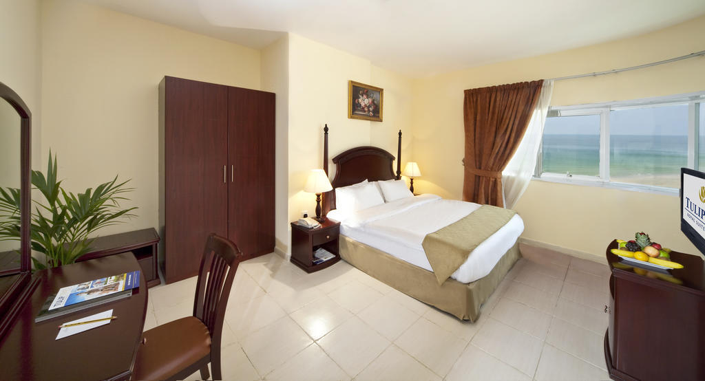 Tulip Inn Royal Suites Adschman Zimmer foto