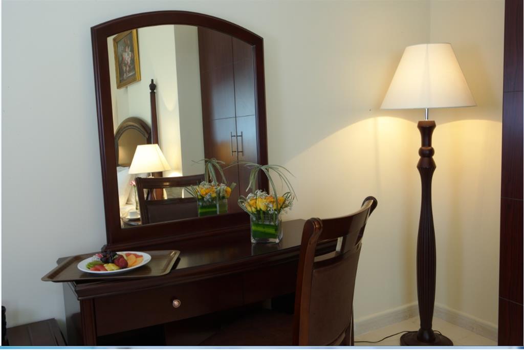 Tulip Inn Royal Suites Adschman Zimmer foto