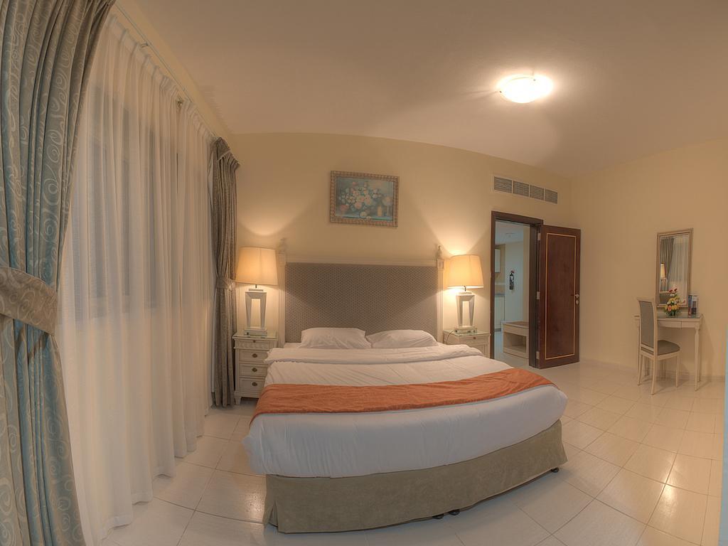 Tulip Inn Royal Suites Adschman Exterior foto